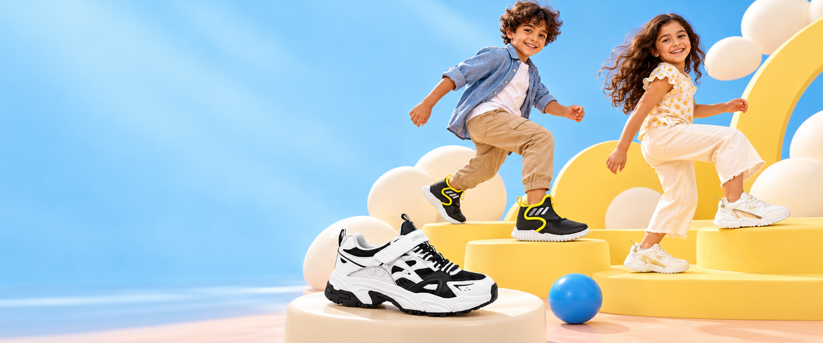 Kids playing in Adidas and Michael Kors shoes, with a Skechers Stamina sneaker.
